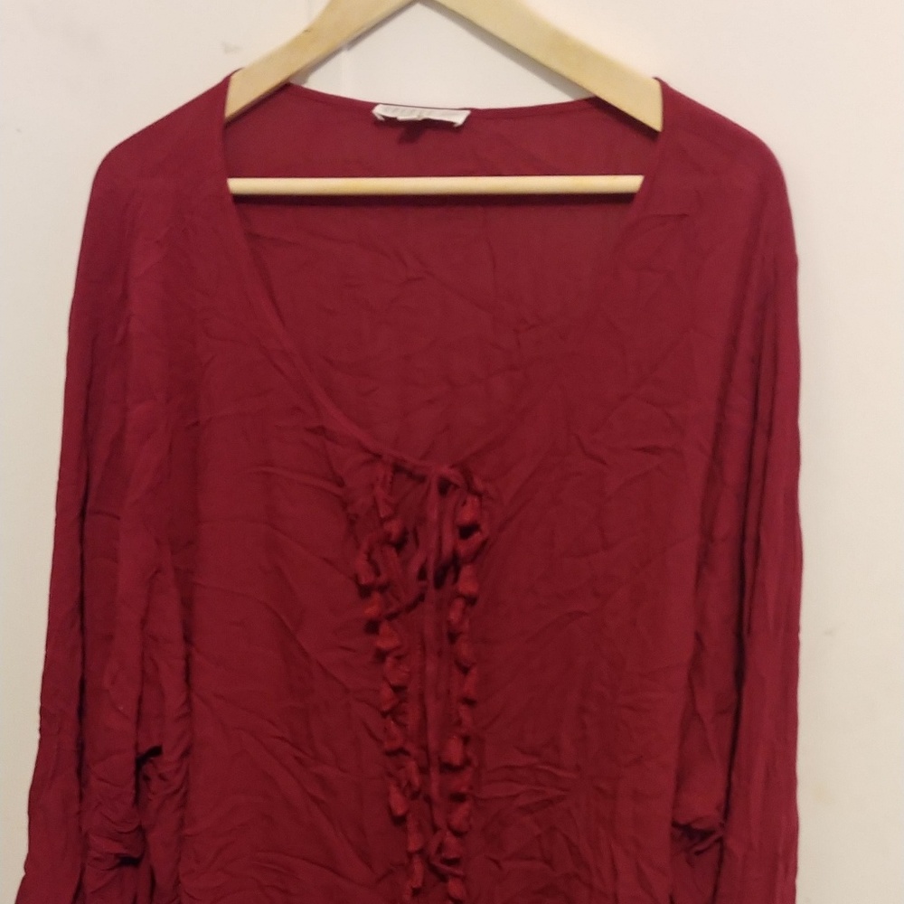 Maroon colored blouse